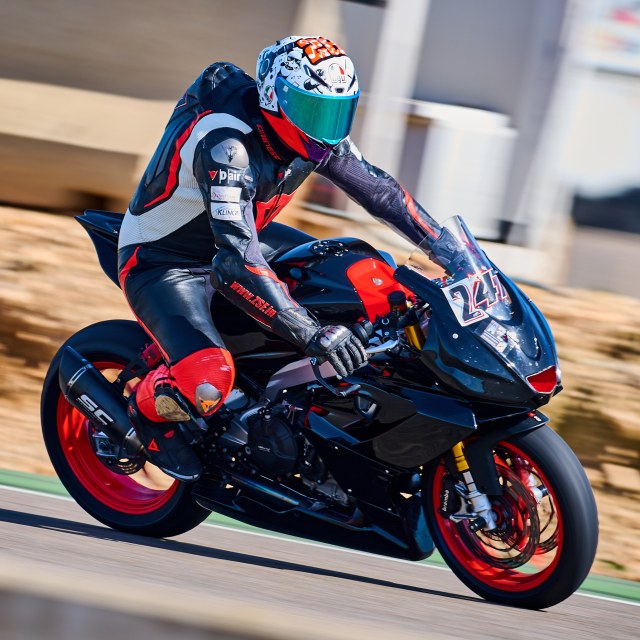 Rider one in a circuit corner, view 1